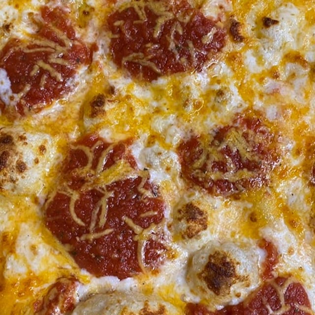 Four Cheese Gluten Free Cauliflower Pizza.