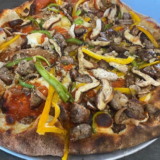 Deluxe Red Sauce Cauliflower Pizza.