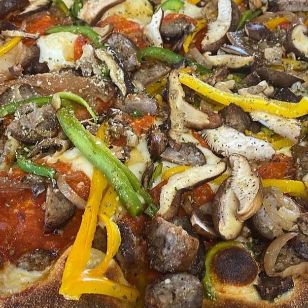 Deluxe Red Sauce Pizza.